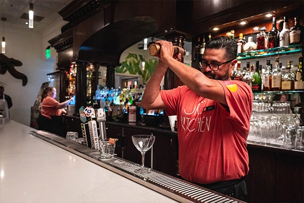 Bartender mixing cocktail