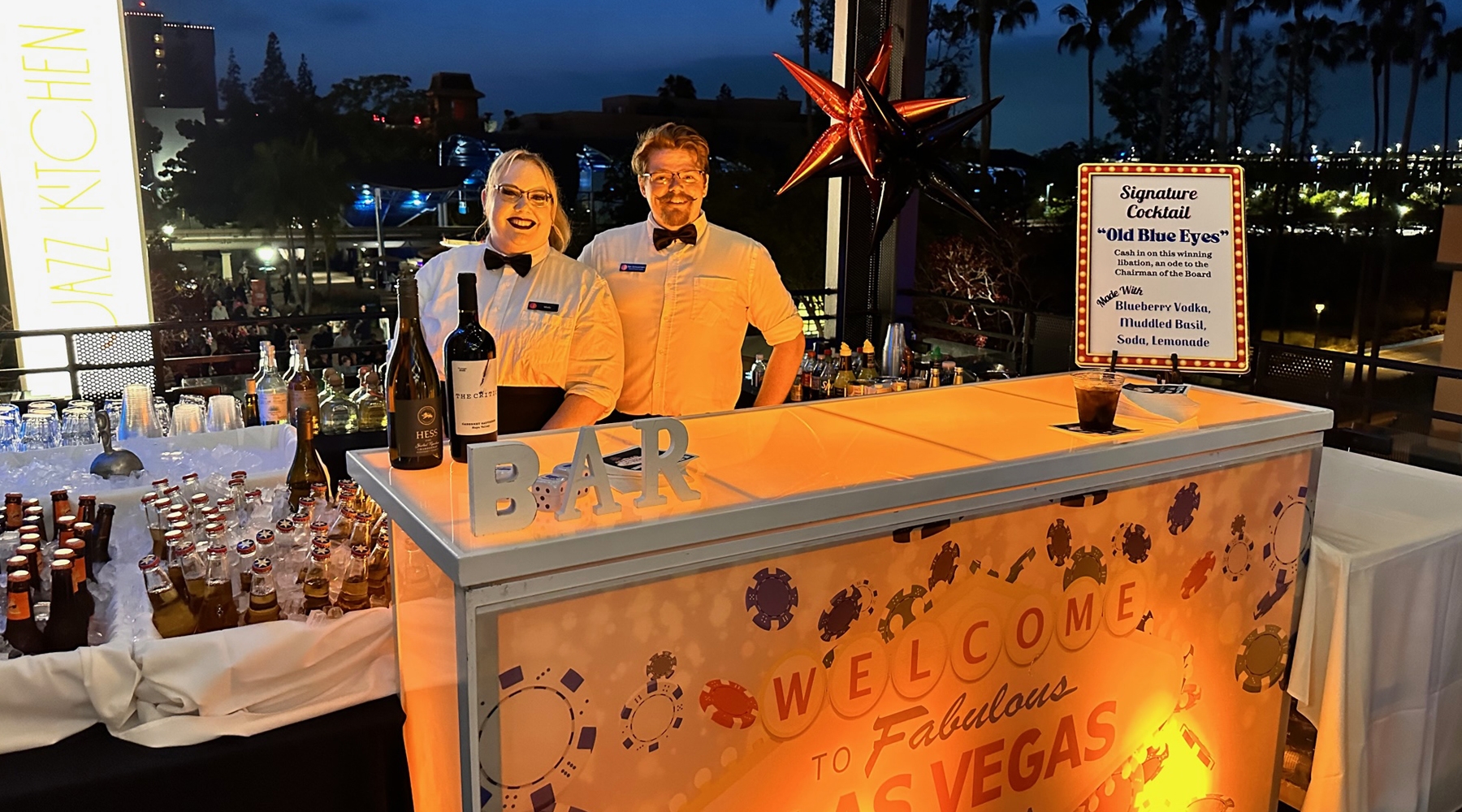 Two employees at bar