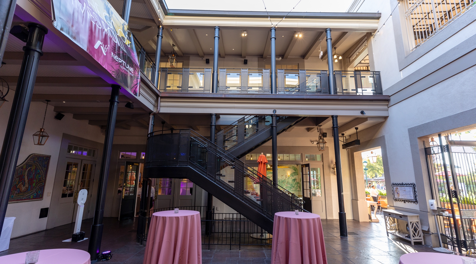 Tall tables and balcony view of facility