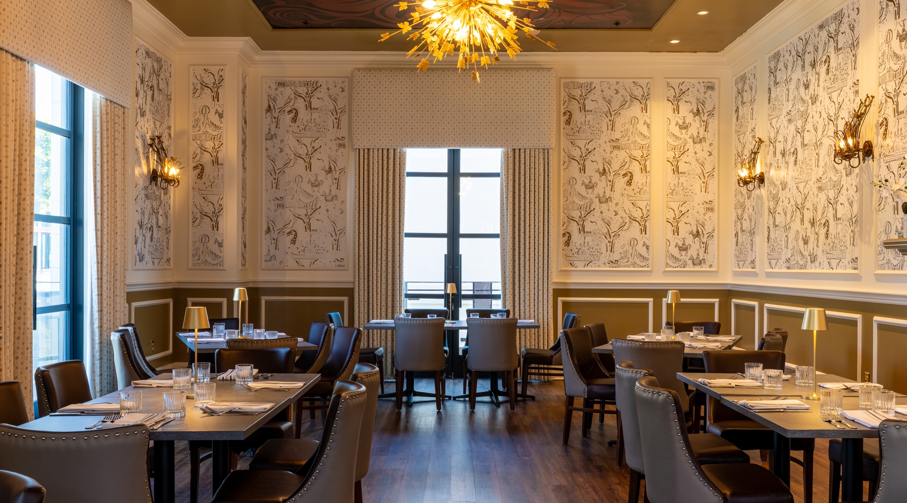 Long tables and seating area in event room