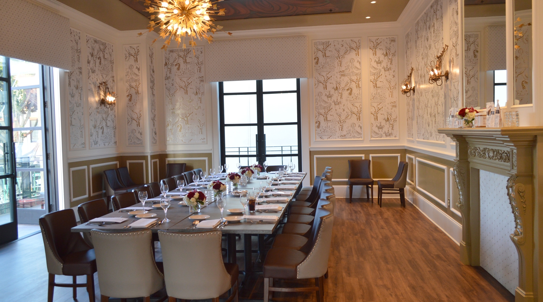 Long tables and seating area in event room