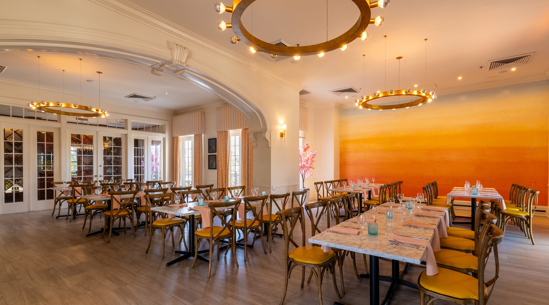 Long tables and seating area in event room